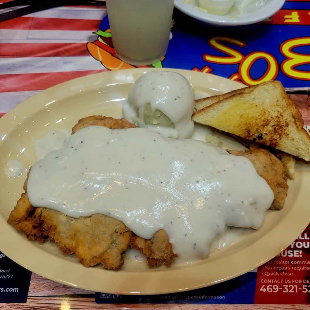 Chicken fried steak smothered in cream gravy with mashed potatoes and Texas toast at Bebo's and Kathy's Cafe