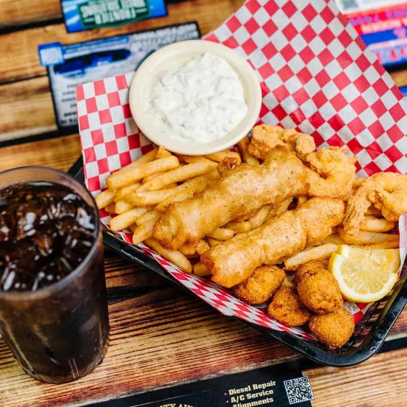Fried catfish and shrimp basket at Chisholms Restaurant in Godley, Texas