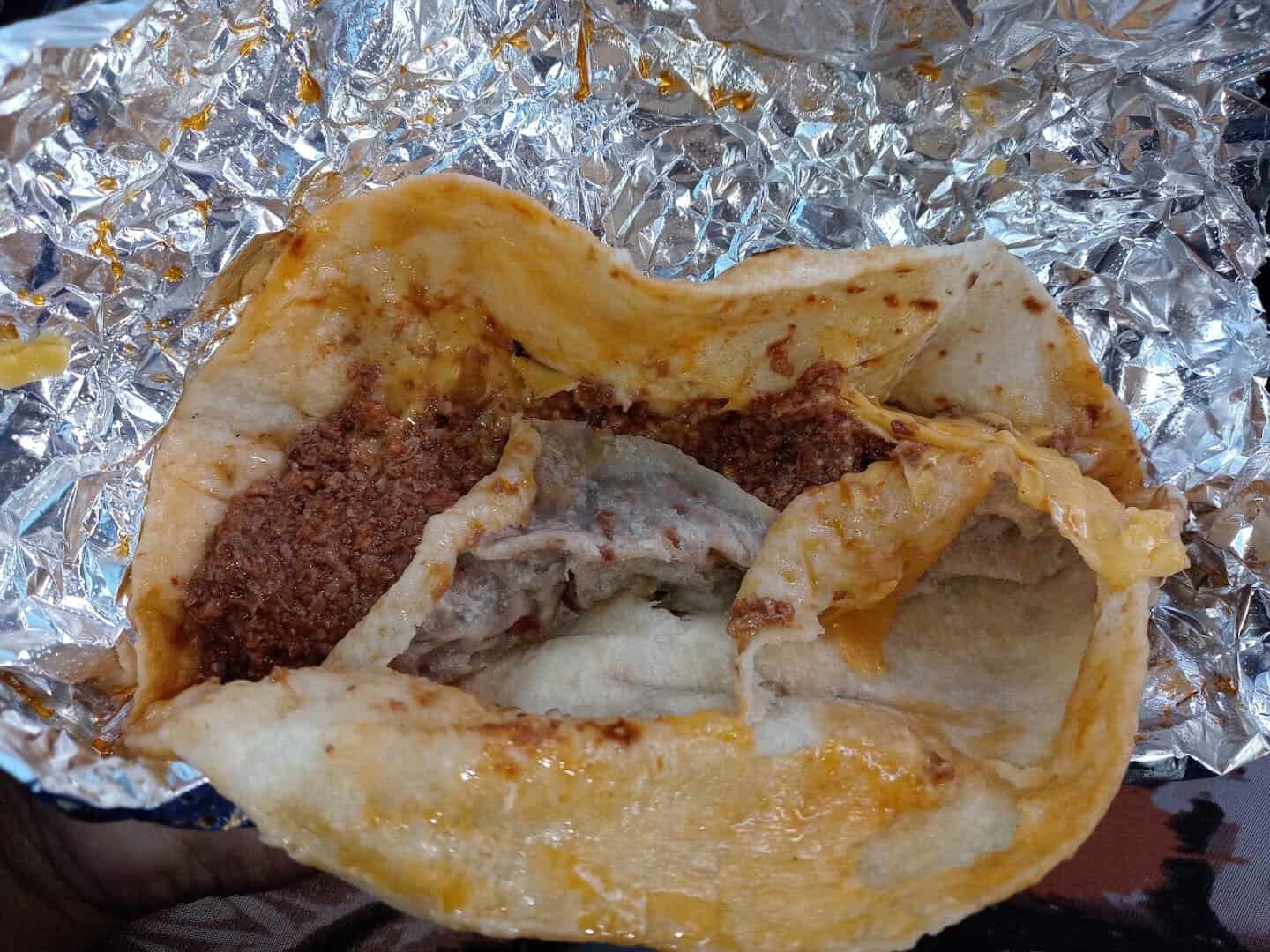 Chorizo and cheese breakfast taco in a flour tortilla at Southside Barbacoa in Corpus Christi