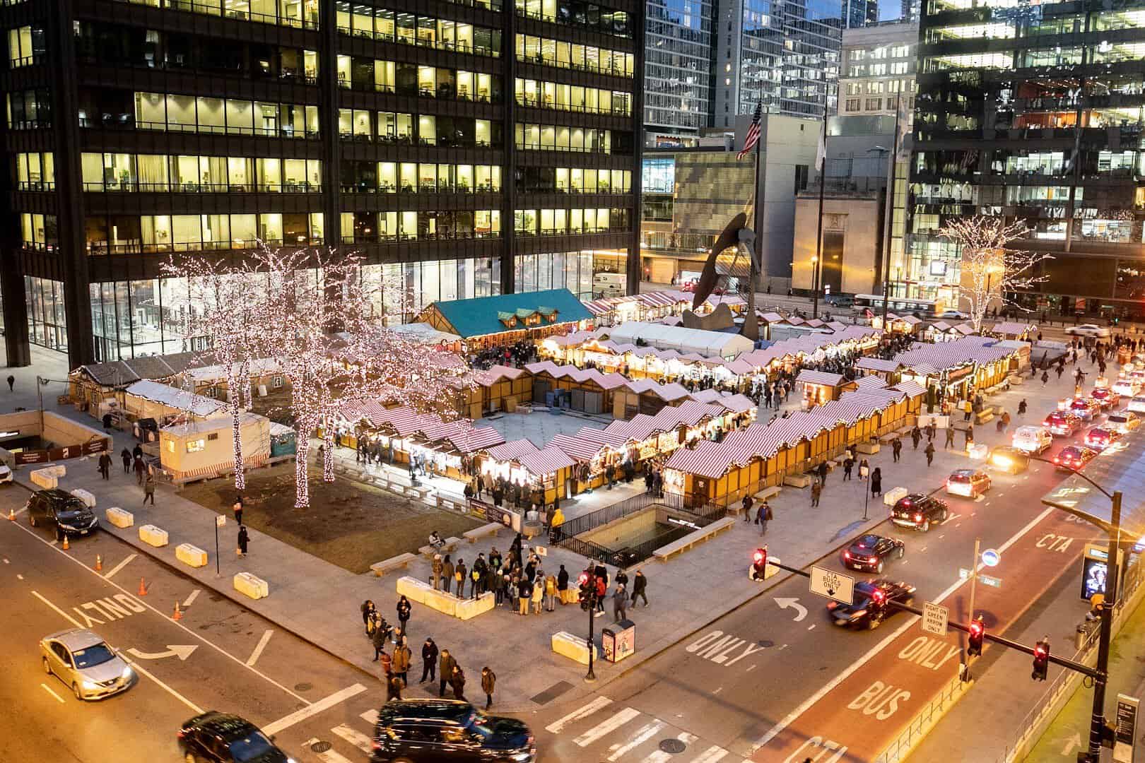 Christkindlmarket Chicago glowing at night in Daley Plaza, Chicago, Illinois