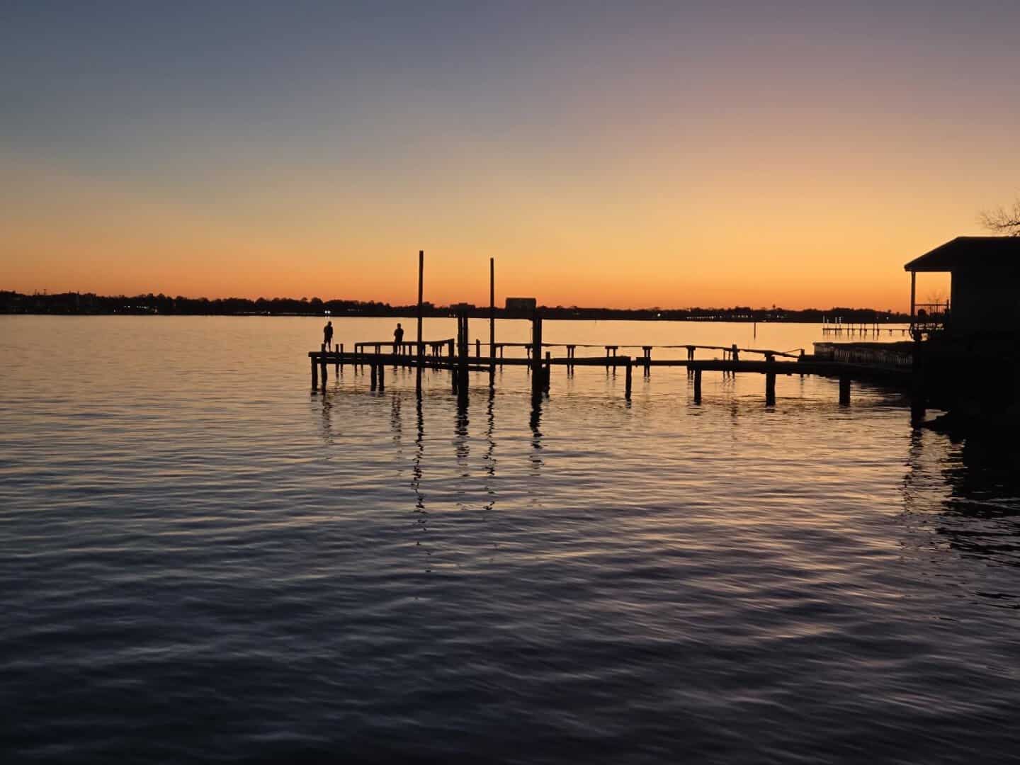 Sunset over Clear Lake beside the dock at Barge 295 in Seabrook, Texas