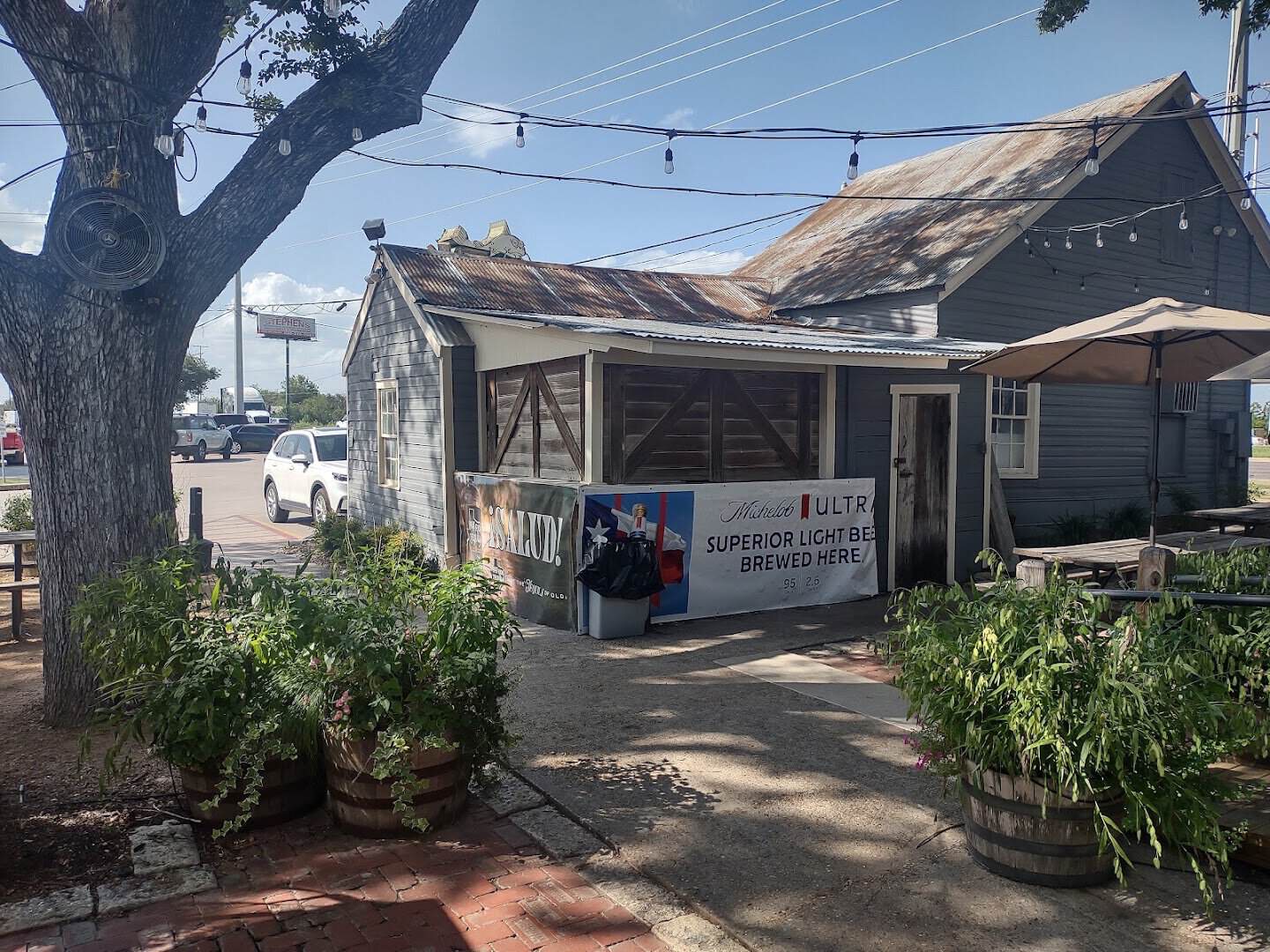 The plain rustic exterior of Clear Springs Restaurant on Highway 46 in New Braunfels, Texas