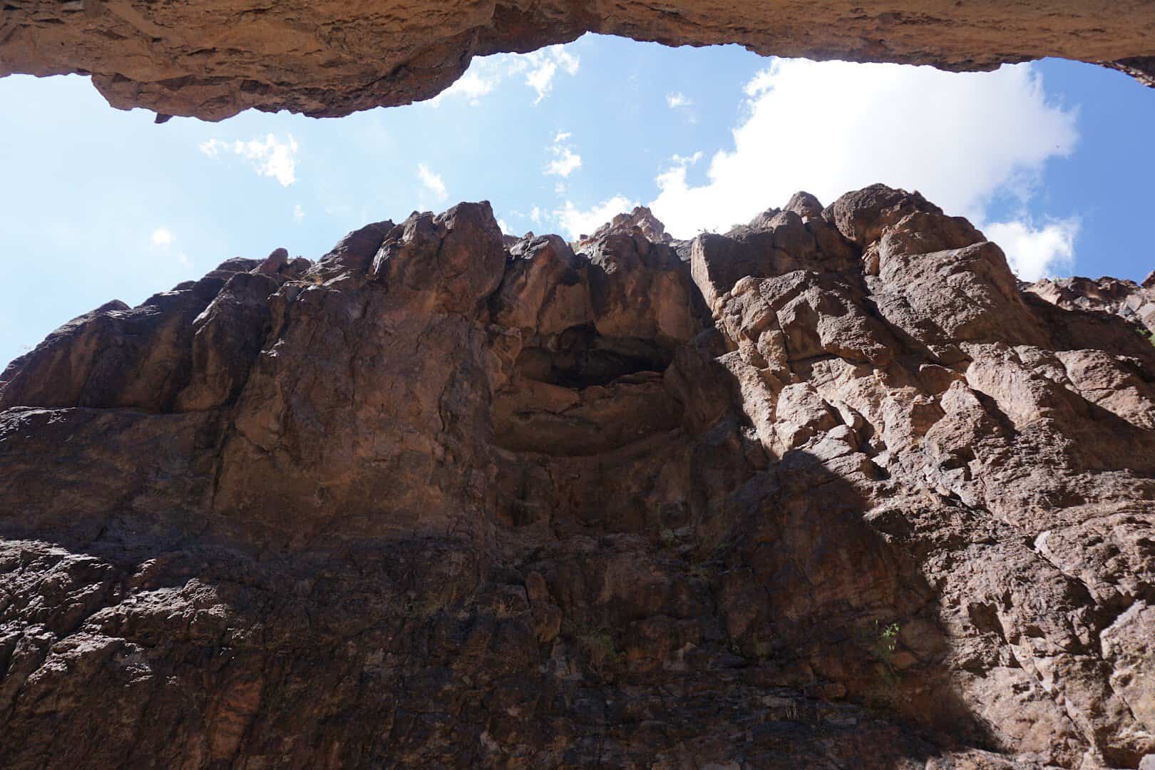 Towering canyon walls rising over the trail into Closed Canyon, Big Bend Ranch State Park, Texas