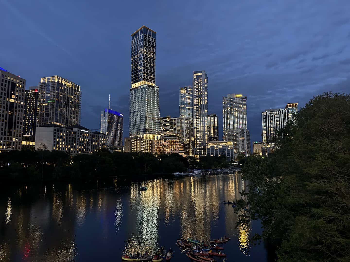 Austin skyline and Congress Avenue Bridge over Lady Bird Lake at dusk, Austin, Texas