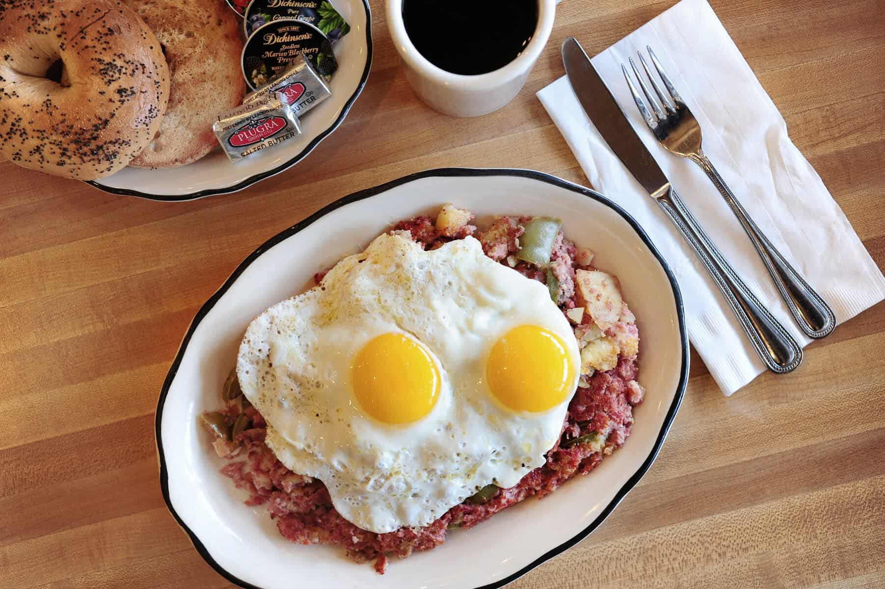 Corned beef hash topped with two eggs at Kenny & Ziggy's in Houston