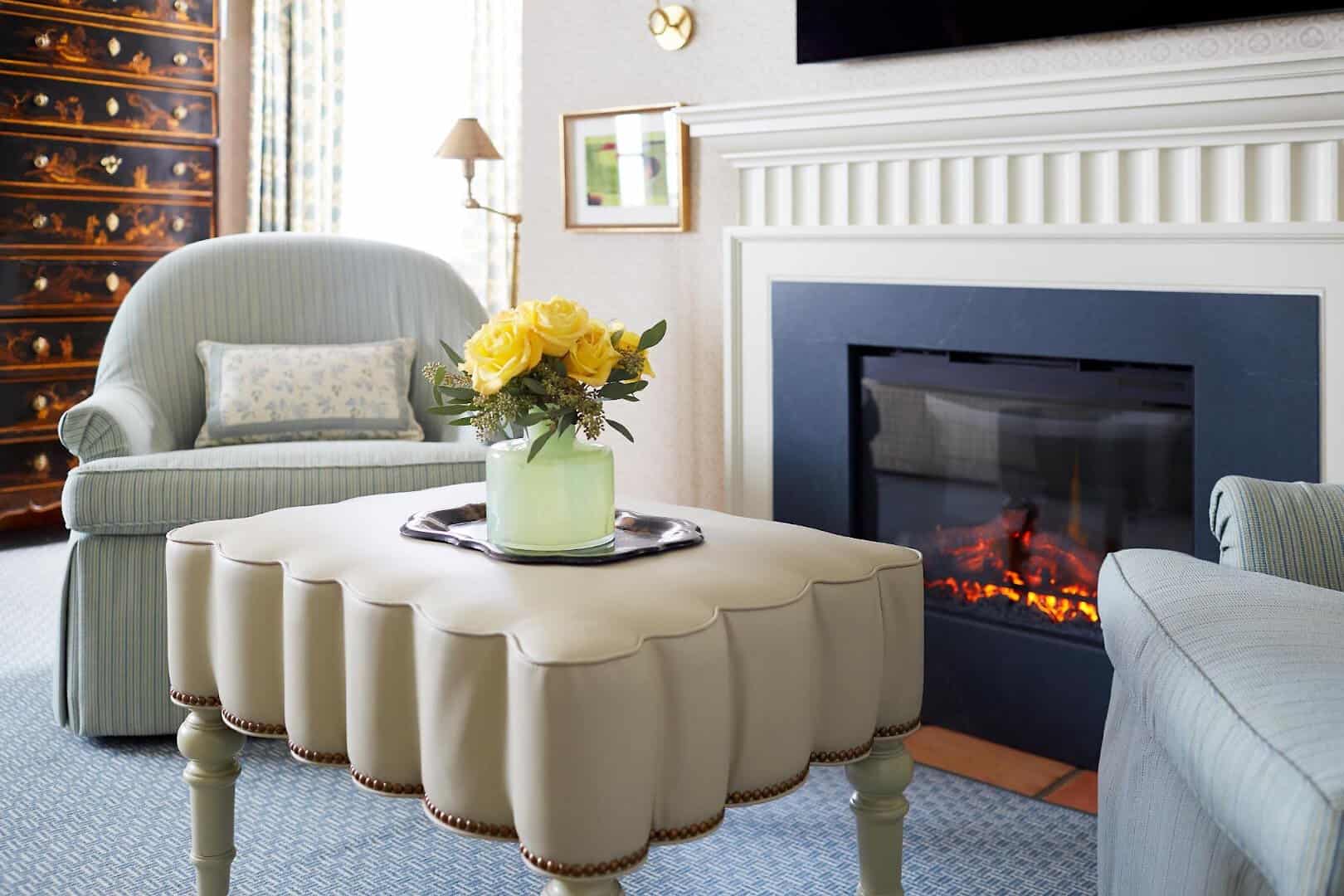 Cottage living room with fireplace at Lake Austin Spa Resort