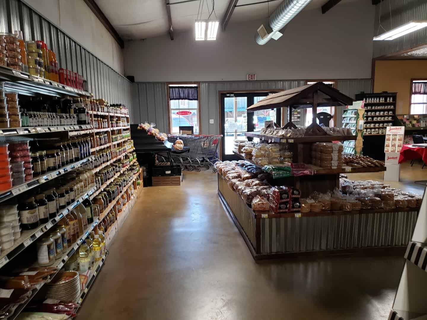 Grocery aisle inside Olde Towne Country Store in Itasca, Texas