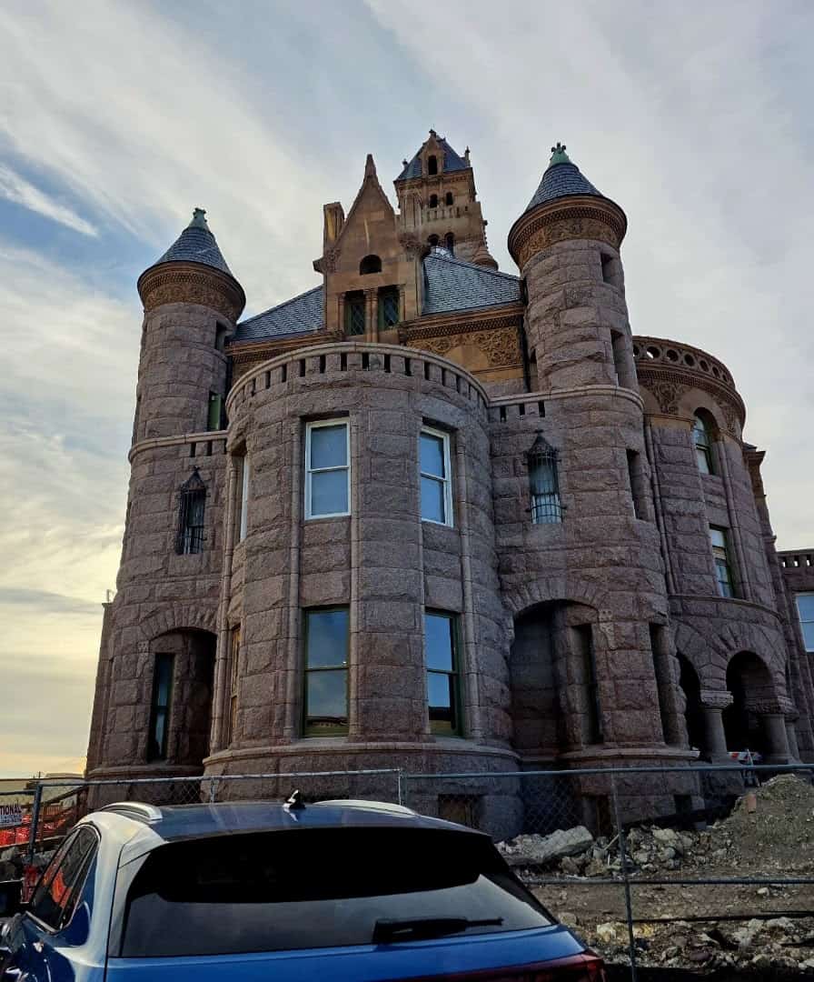 Turrets and tower of the Wise County Courthouse against the sky