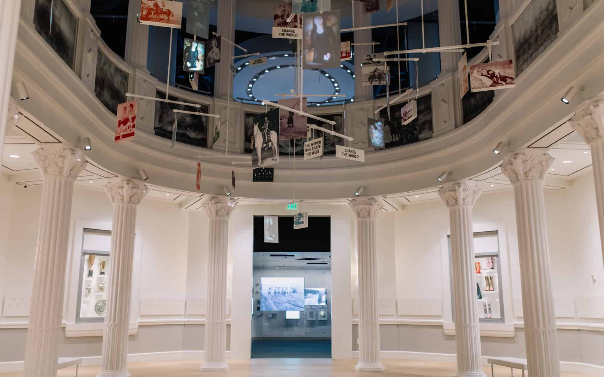 Hall of Fame rotunda with hanging honoree photographs at the National Cowgirl Museum in Fort Worth
