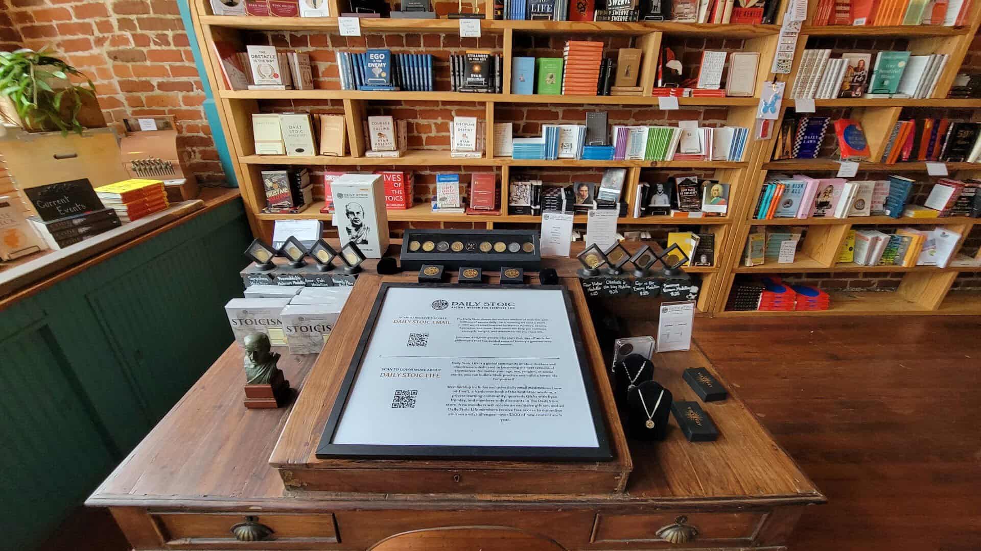 Display of Ryan Holiday's Daily Stoic books and shelves at The Painted Porch Bookshop in Bastrop, Texas