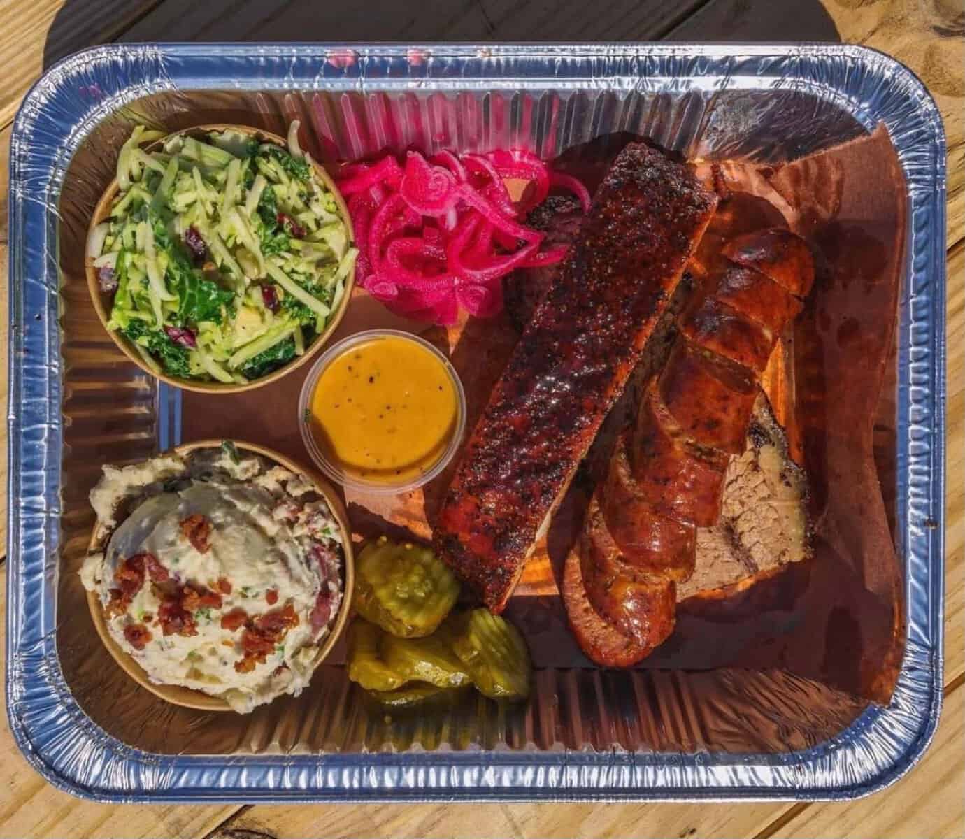 Barbecue ribs, sausage and brisket plate from a restaurant on the Decatur square