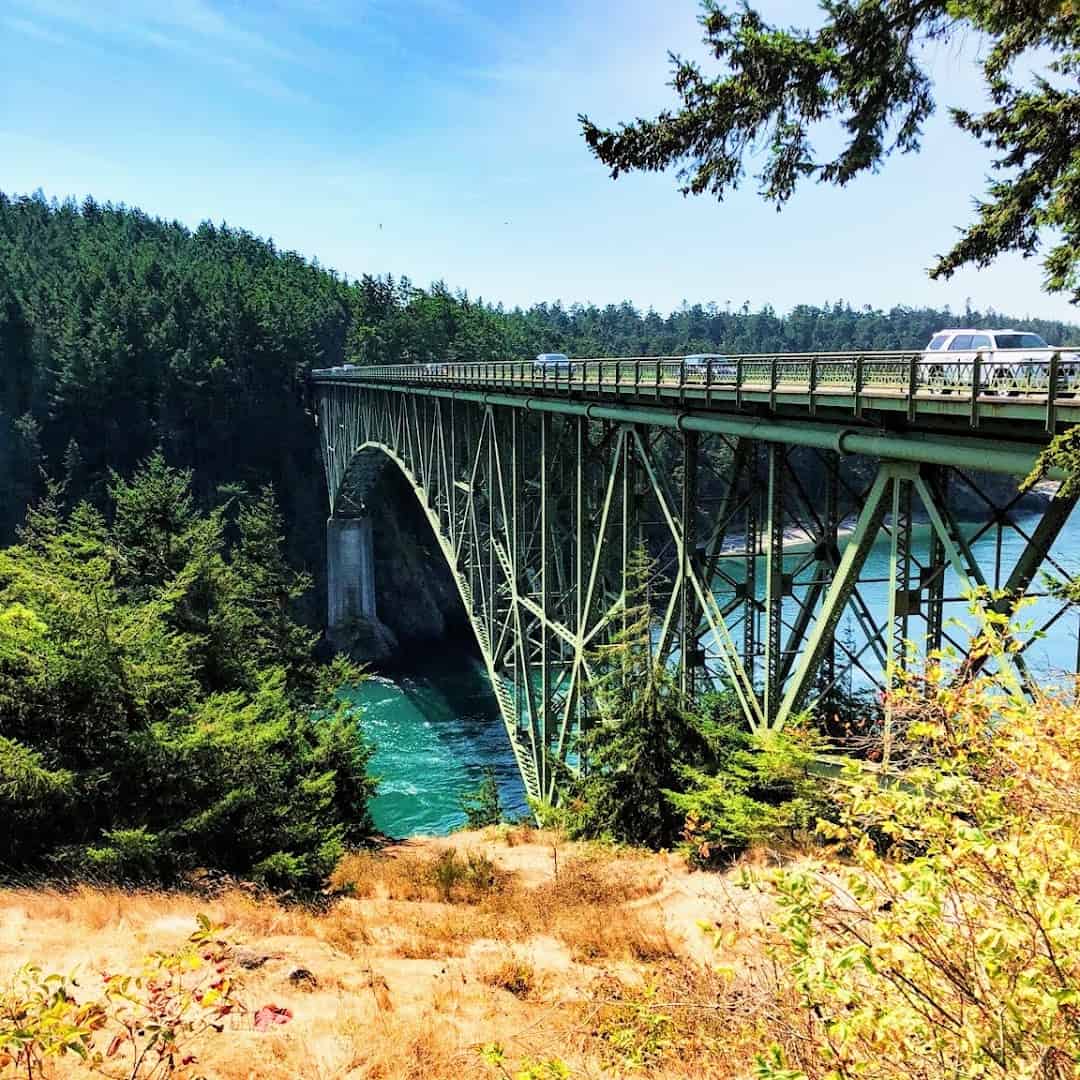 Deception Pass Bridge spanning the green tidal channel between Whidbey and Fidalgo islands, Washington