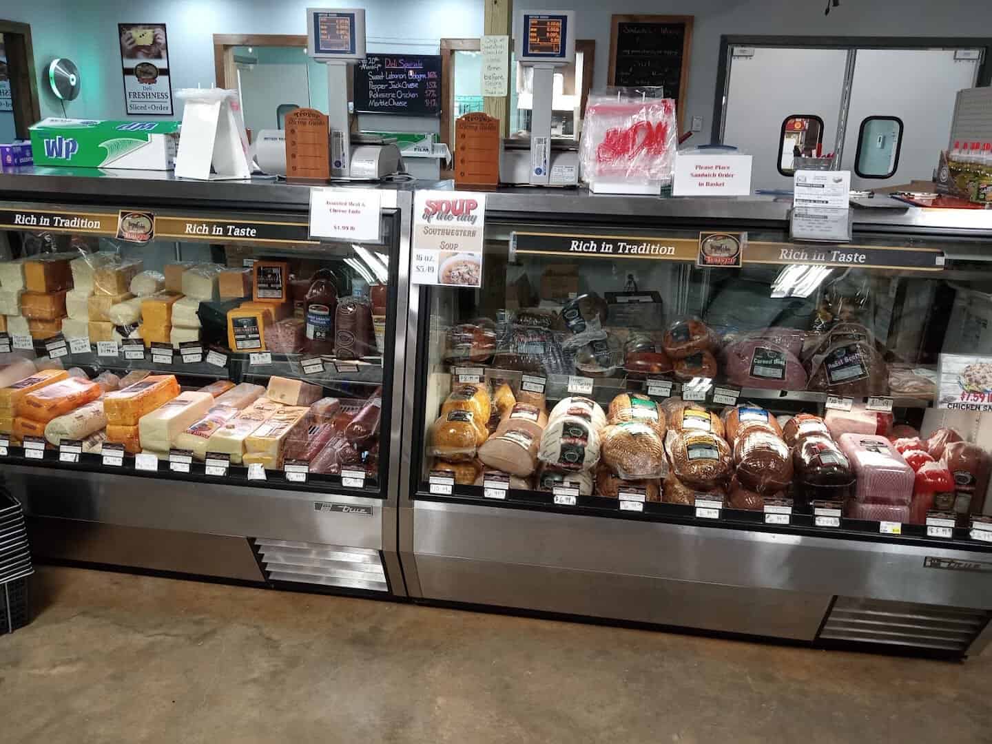Deli case of meats and cheeses sliced to order at Olde Towne Country Store in Itasca Texas
