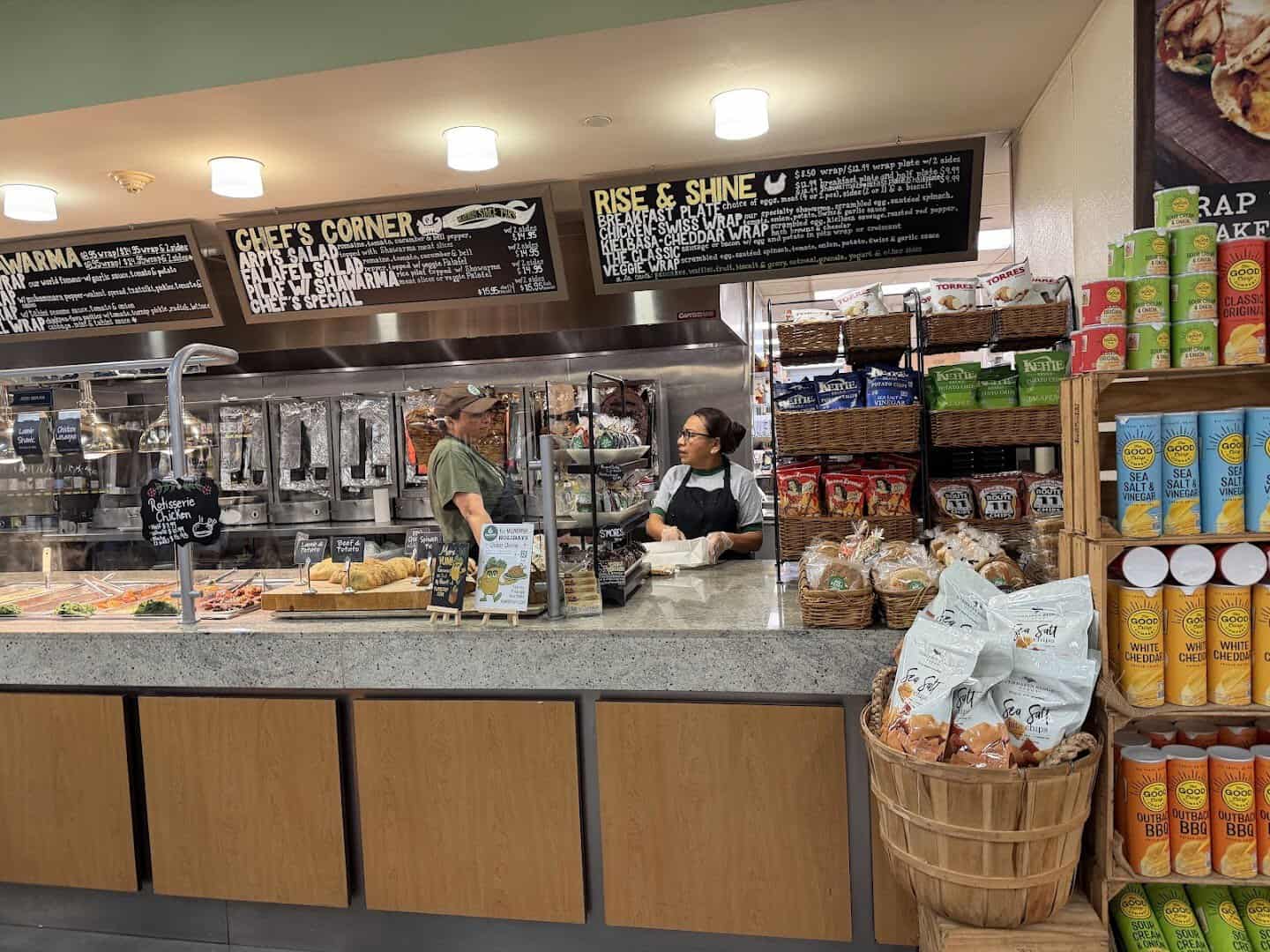 Deli counter and menu board at Phoenicia Specialty Foods in Houston