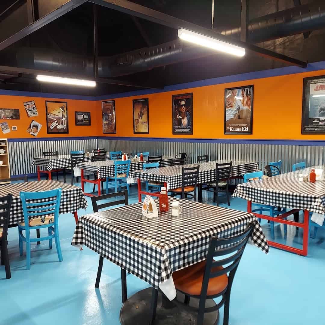 Dining room with checkered tablecloths at Mel's Diner in Mingus, Texas