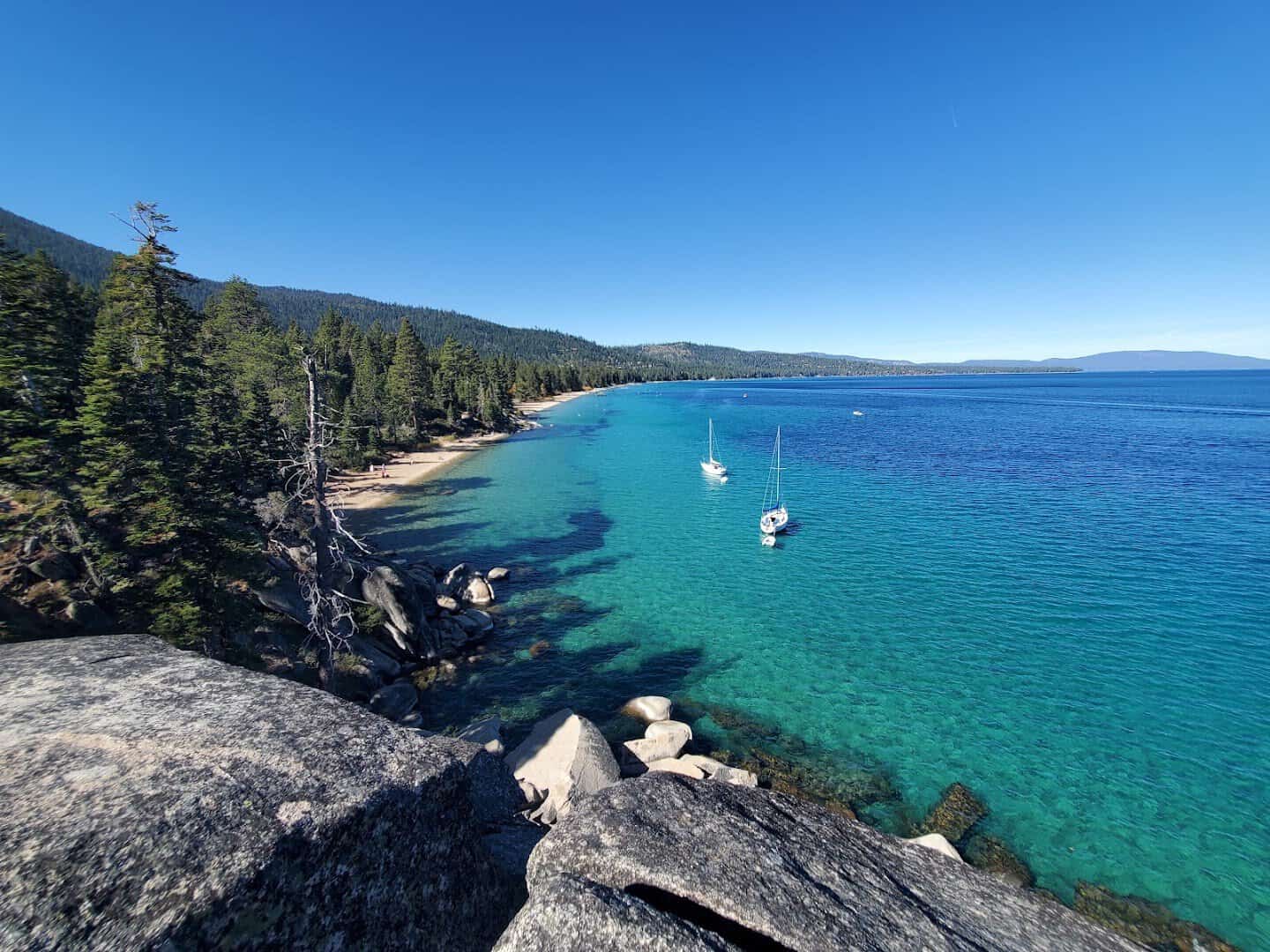 Clear turquoise cove and granite shoreline at D.L. Bliss State Park, Lake Tahoe, California