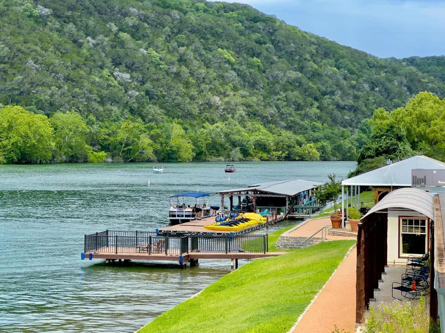 Dock and boats on the lake at Lake Austin Spa Resort