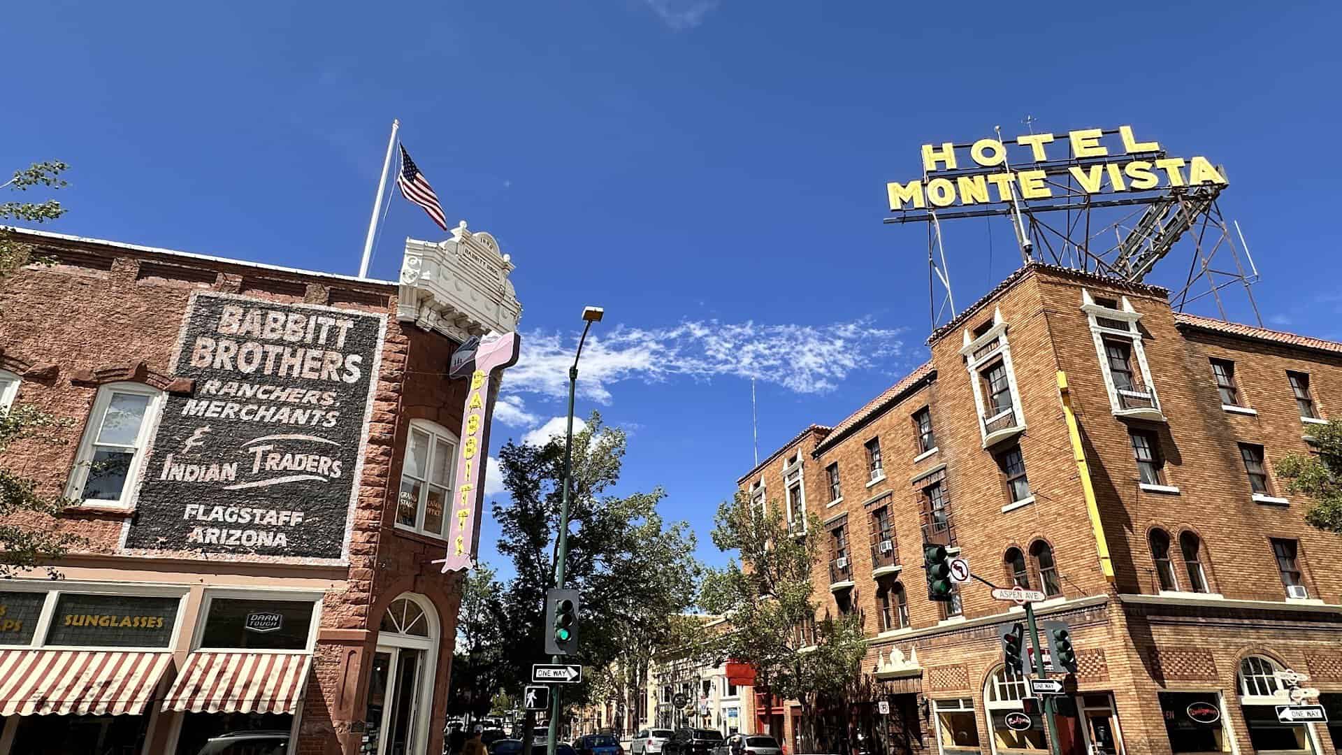 Historic brick storefronts and vintage signs in downtown Flagstaff, Arizona