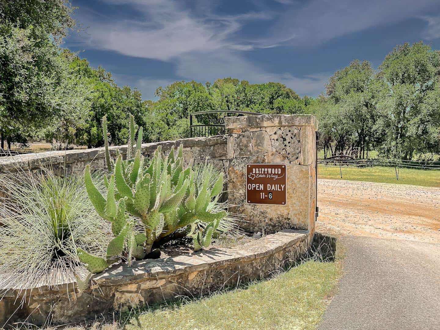 The stone entrance sign at Driftwood Estate Winery in Driftwood, Texas
