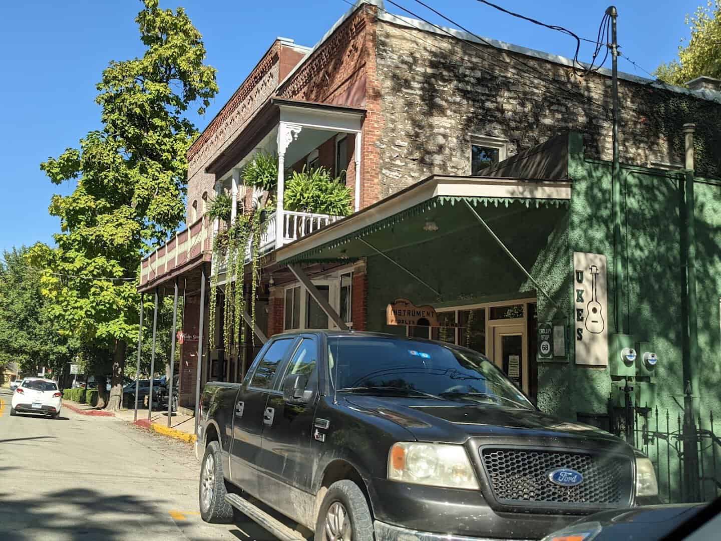 Historic downtown stone building on a hillside street in Eureka Springs, Arkansas