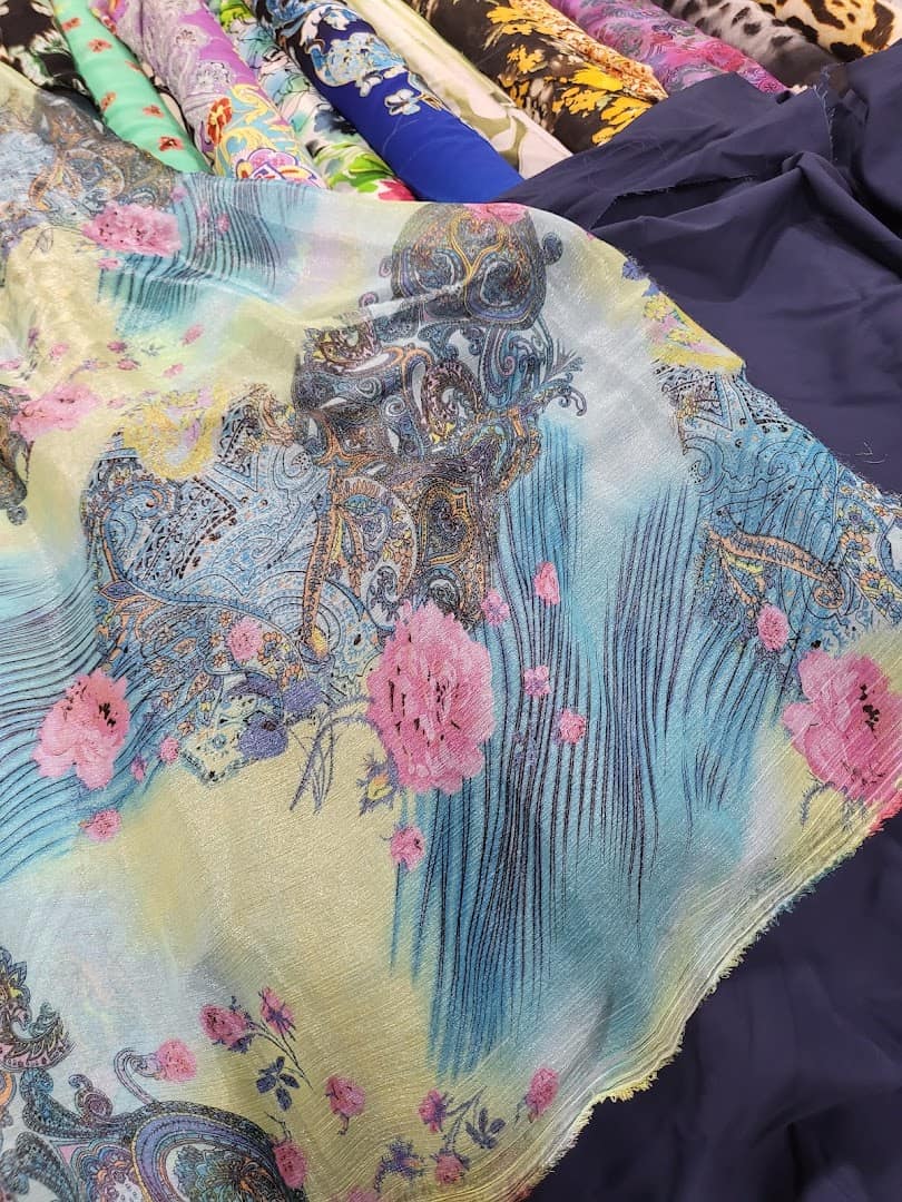 Floral sheer apparel fabric draped at Wherehouse Fabrics in Dallas