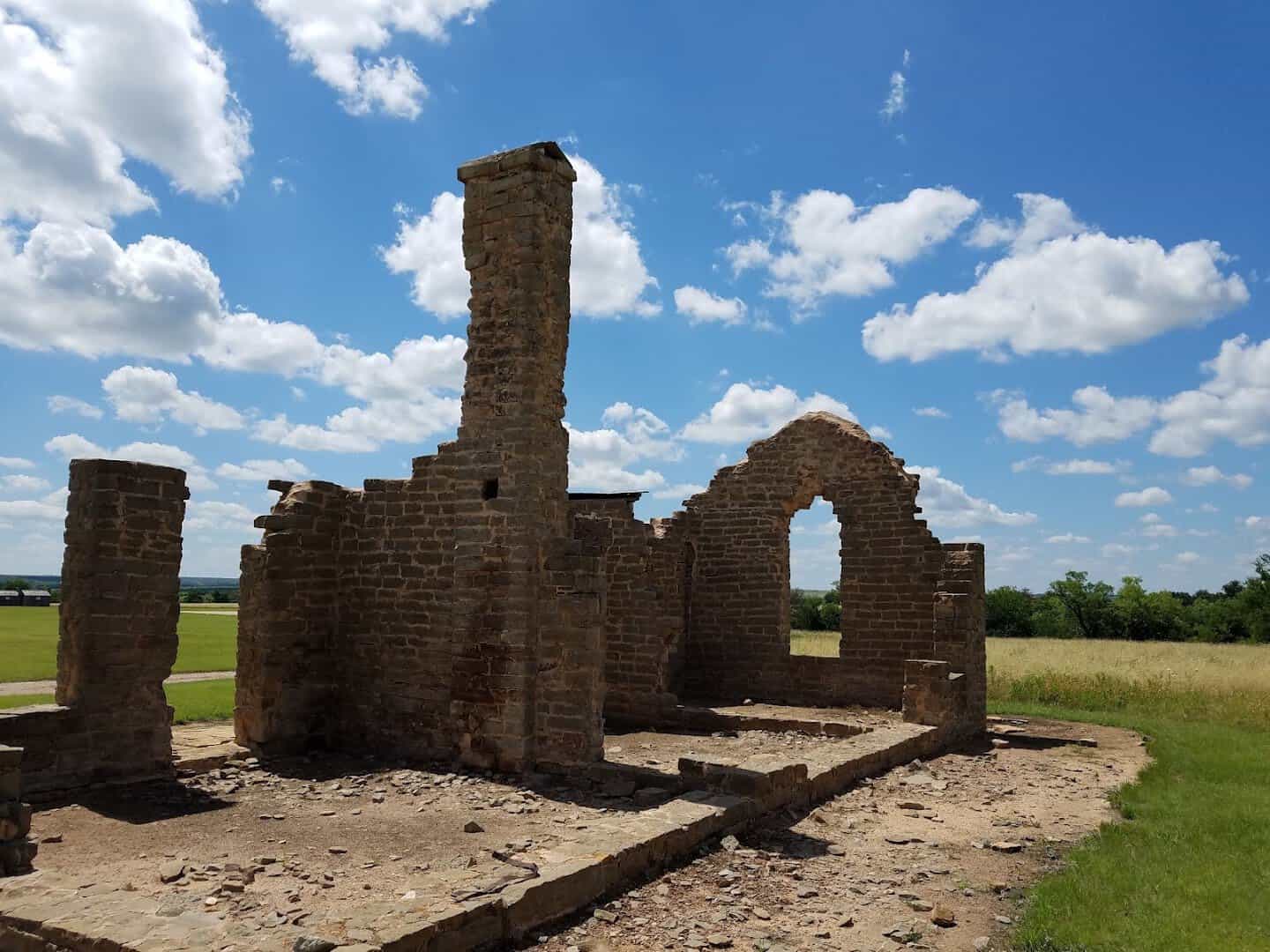 Stone ruins with an arched wall at Fort Griffin State Historic Site near Albany, Texas