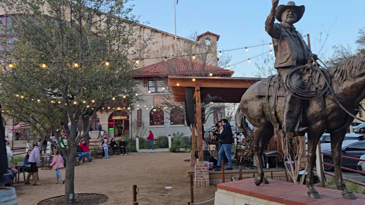 Billy Bob's Texas and a cowboy statue in the historic Fort Worth Stockyards