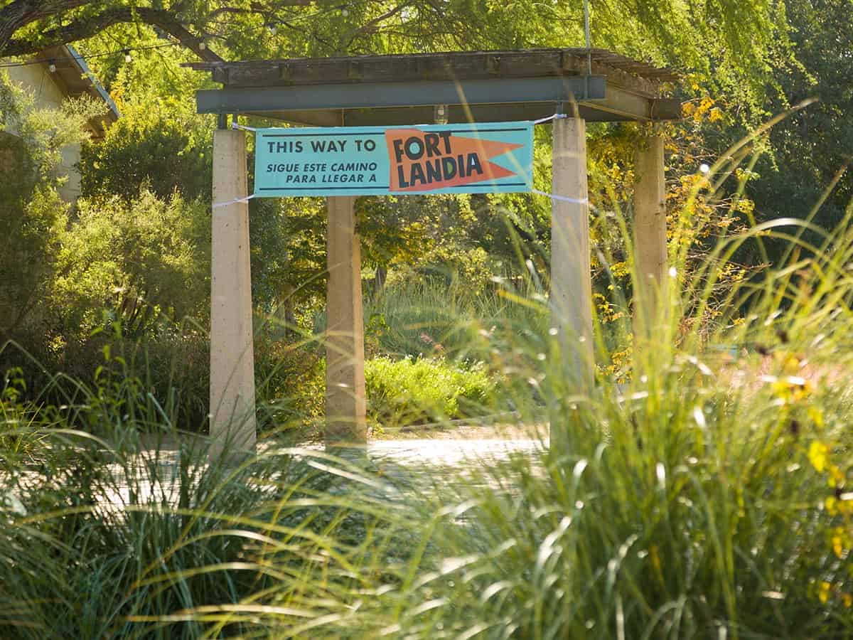 Fortlandia exhibit sign among native grasses at the Lady Bird Johnson Wildflower Center in Austin