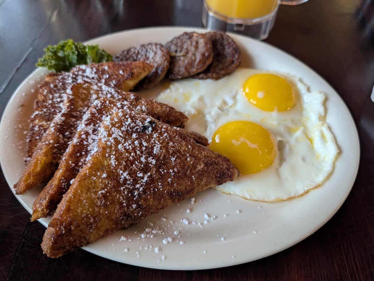 French toast and eggs breakfast plate at Miller's Seawall Grill in Galveston, Texas