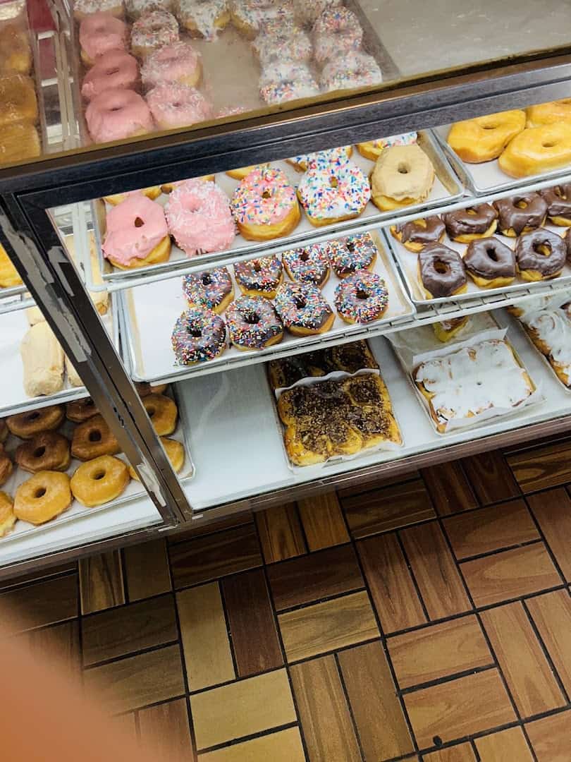 Case of fresh doughnuts at Haby's Alsatian Bakery in Castroville, Texas