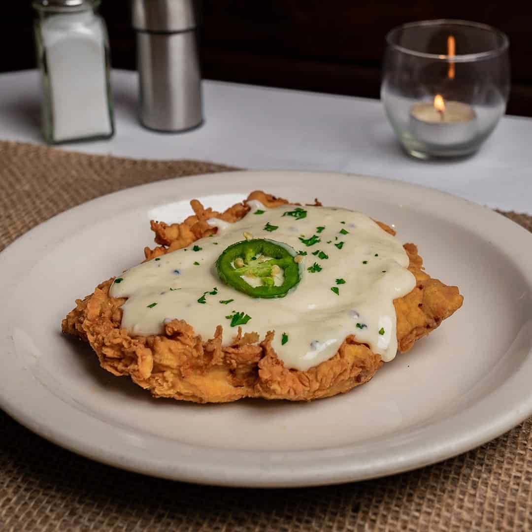 Golden fried chicken with a crackling crust at Celebration Restaurant in Dallas
