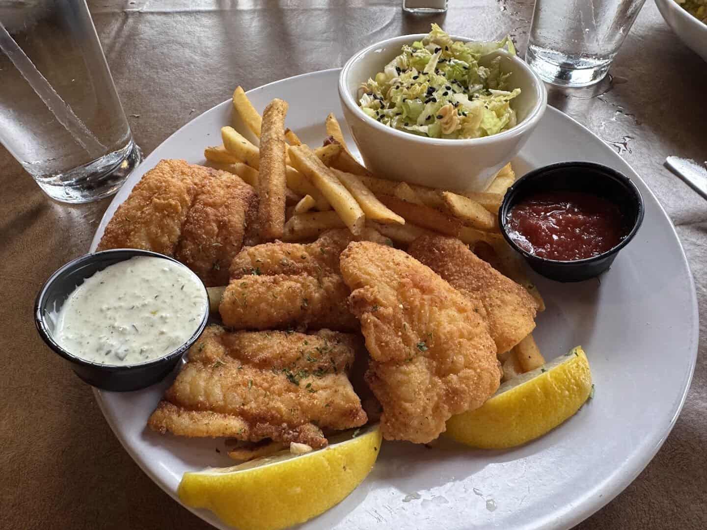 Fried fish and chips platter with slaw and tartar sauce at Gruene River Grill in New Braunfels