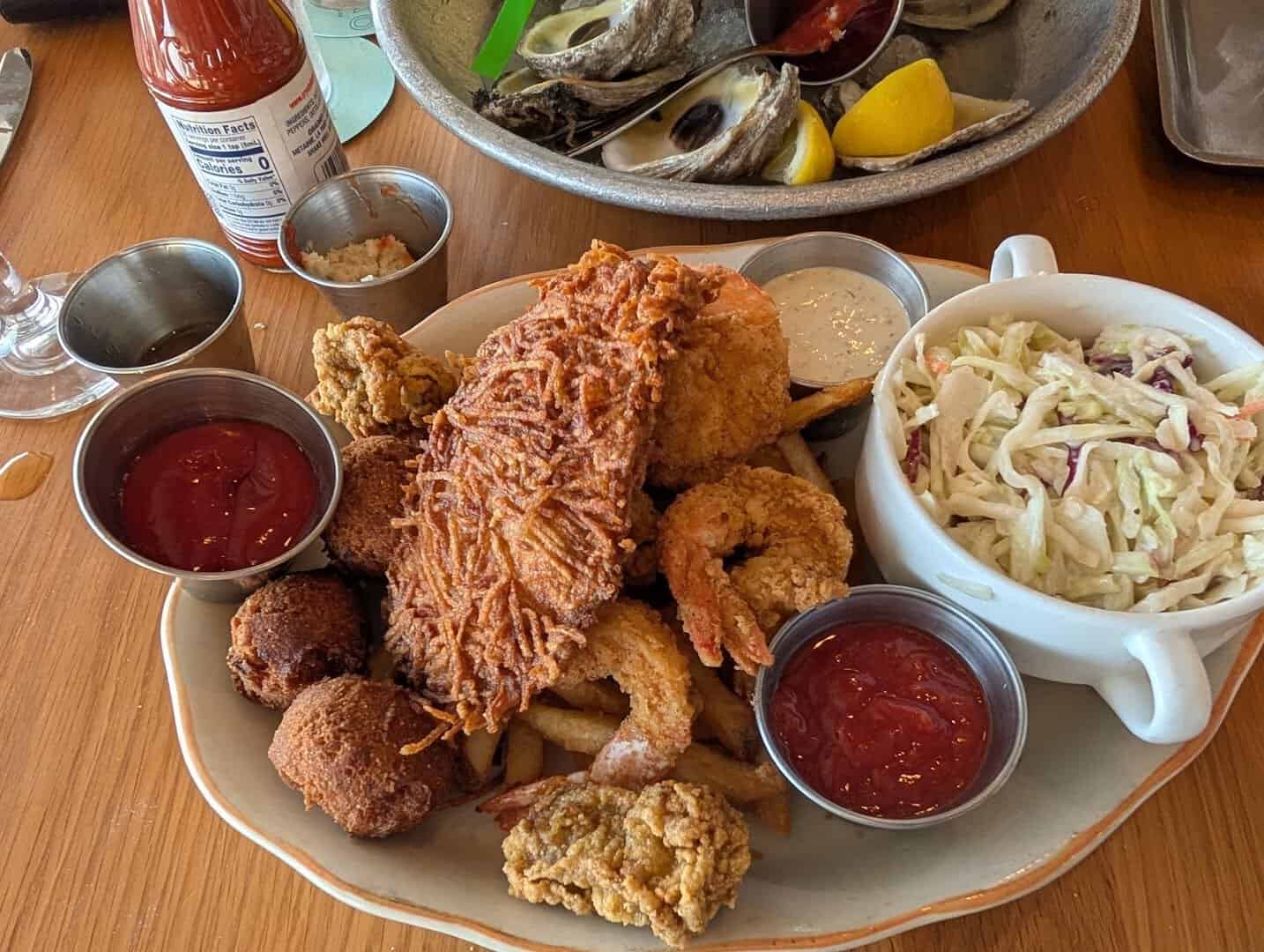 Fried seafood platter with shrimp, oysters and hush puppies at Pier 6 in San Leon, Texas