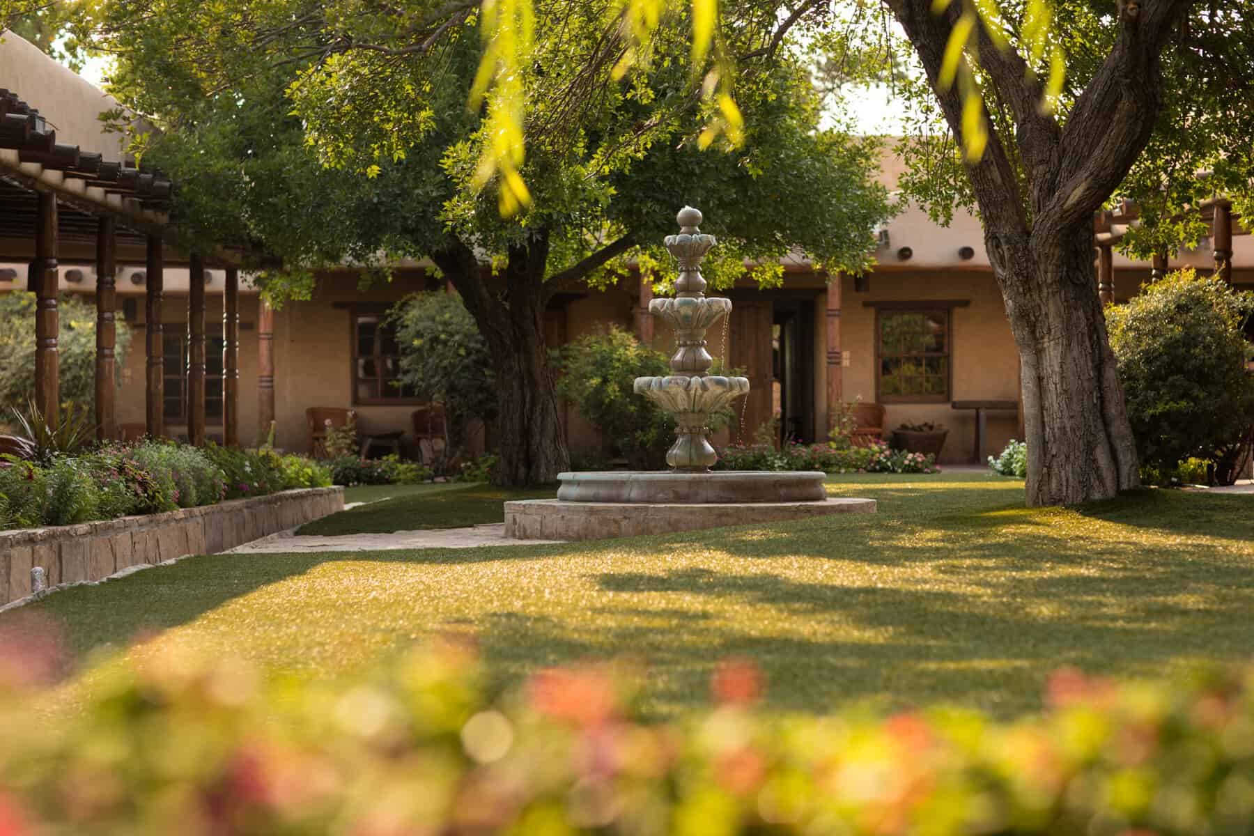 Shaded courtyard with a fountain at the Gage Hotel in Marathon, Texas