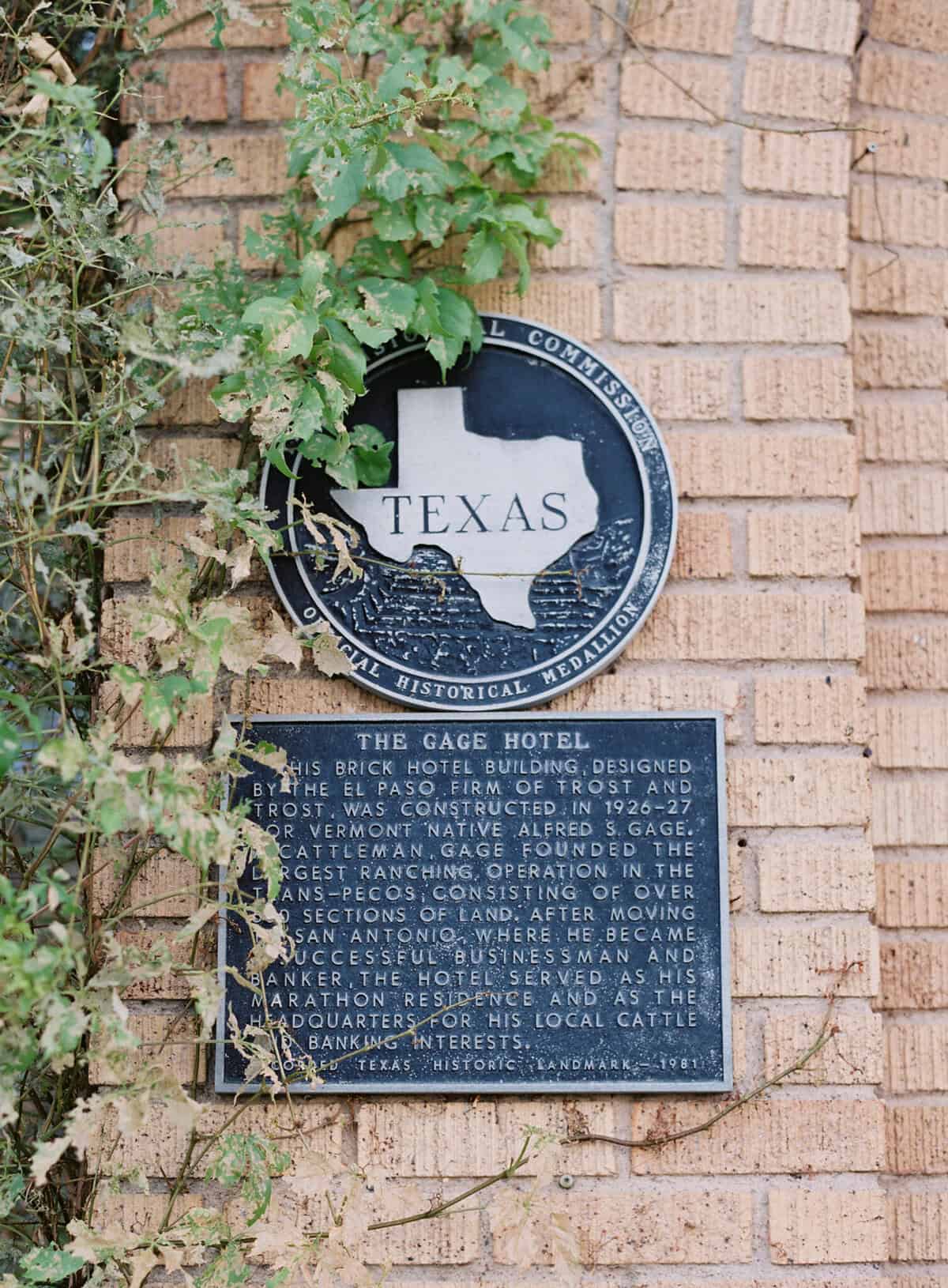 Texas historical marker on the brick wall of the Gage Hotel
