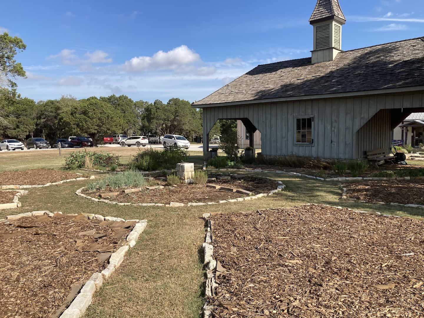 Herb and vegetable garden beds on the farm at Homestead Heritage near Waco, Texas