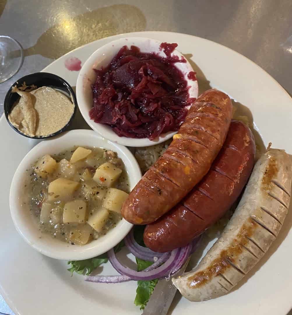 German sausage sampler with red cabbage and potatoes at Rathskeller Bistro