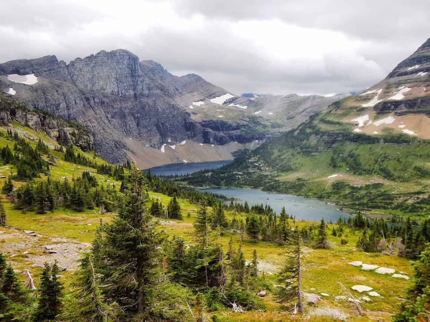 Hidden Lake seen from the trail overlook with peaks and meadows, Glacier National Park, Montana