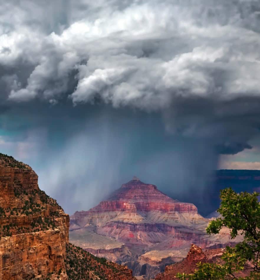 Storm clouds over the layered buttes of the Grand Canyon, Arizona