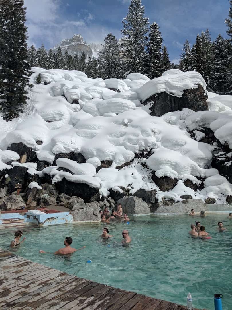 The turquoise Granite Hot Springs pool surrounded by deep snow in the Bridger-Teton National Forest, Wyoming