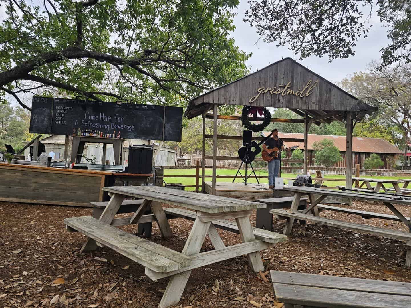 Shaded courtyard with picnic tables in the Gruene Historic District