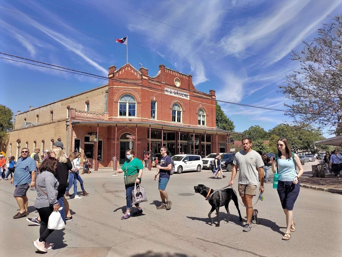 Visitors strolling the main street of the Gruene Historic District in Texas