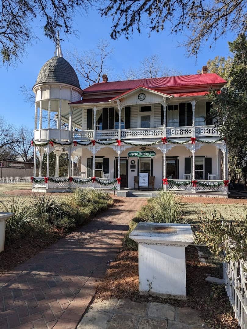 The Victorian Gruene Mansion Inn with its round turret in Gruene, Texas