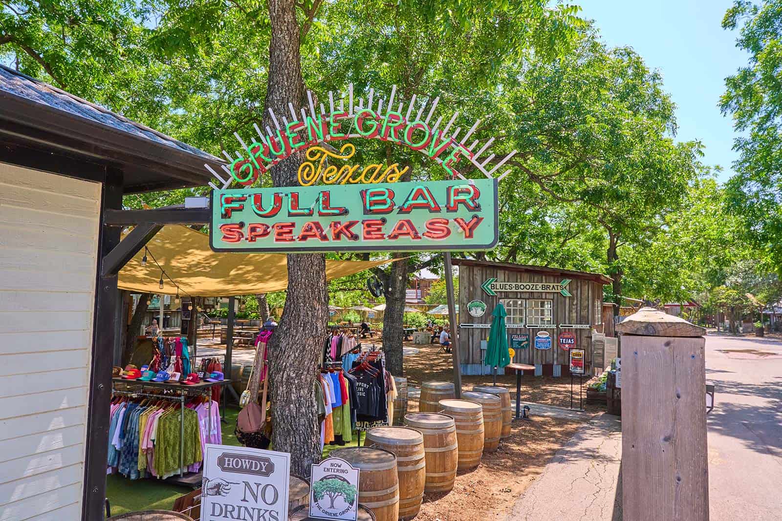 Vendor stalls and barrels along a lane in the Gruene Historic District