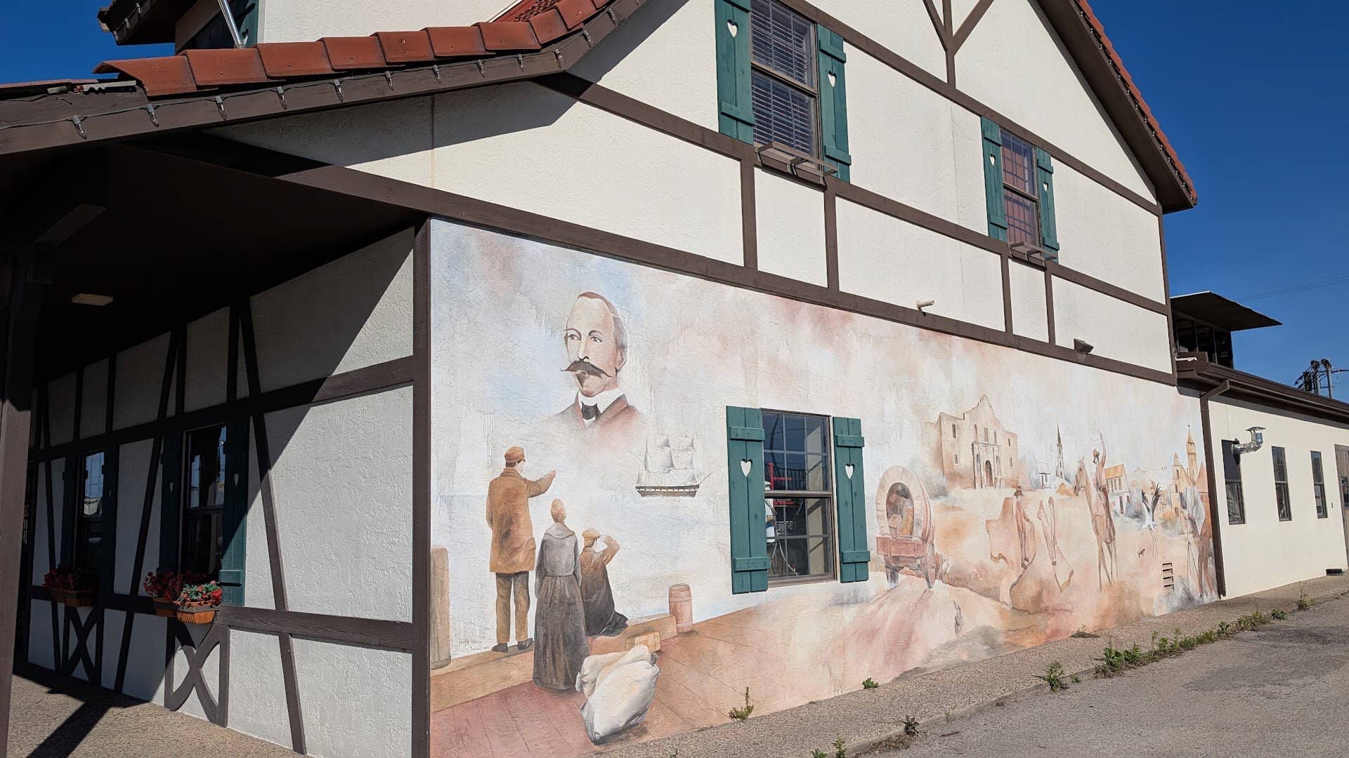 Painted mural on the wall of Haby's Alsatian Bakery in Castroville, Texas
