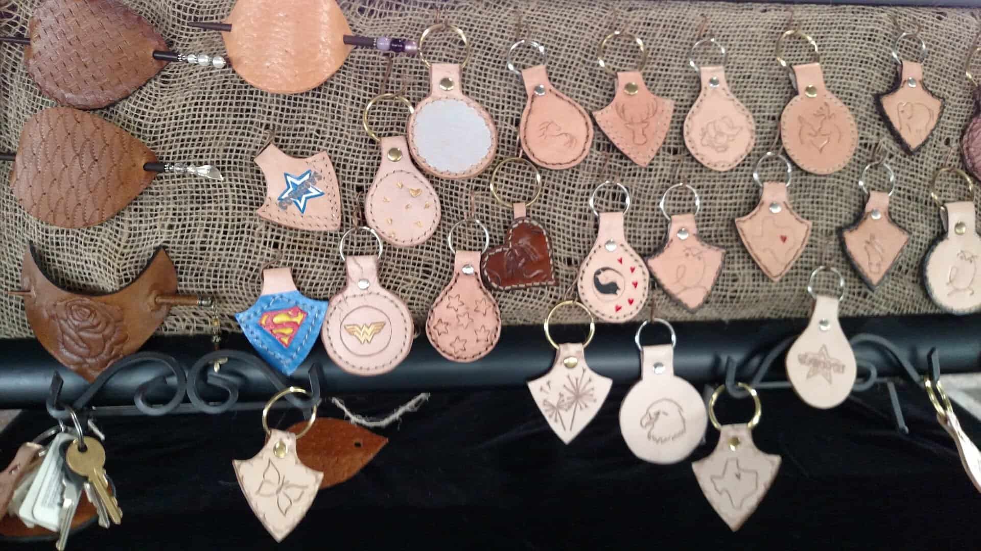 Handmade leather and wood crafts at a Palestine Farmers Market stall