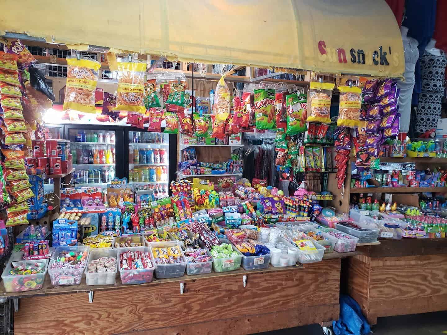 A stall packed with Mexican candy and snacks at Harry Hines Bazaar in Dallas