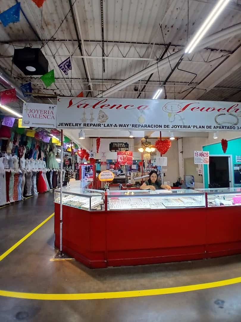 A jewelry counter with gold and silver at Harry Hines Bazaar in Dallas