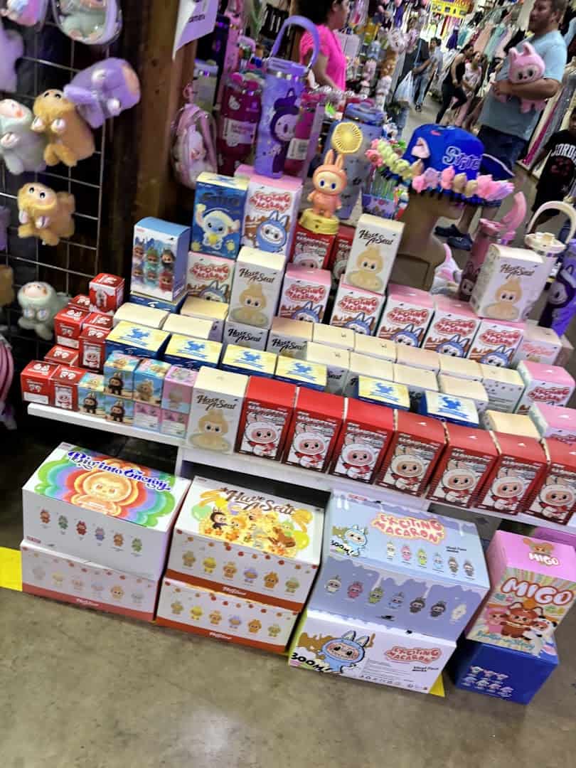 A stall of party supplies and packaged goods at Harry Hines Bazaar in Dallas