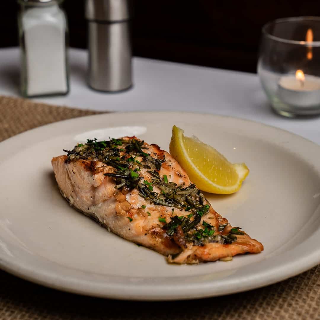 Herb-grilled salmon with lemon at Celebration Restaurant in Dallas